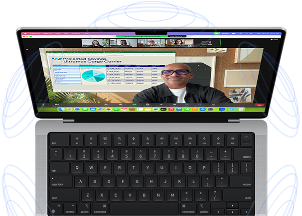 MacBook Pro surrounded by illustrations of blue circles to suggest the 3D feeling of Spatial Audio — Onscreen, a person uses the Presenter Overlay feature in a Zoom video meeting to appear in front of the content they are presenting